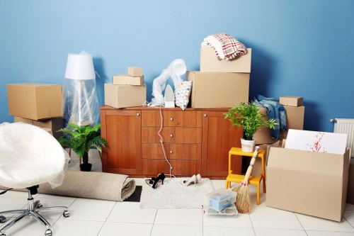 Checklist and packed moving boxes ready for a Wimbledon house removal