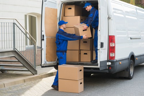 Furniture and boxes being transported by van in Wimbledon