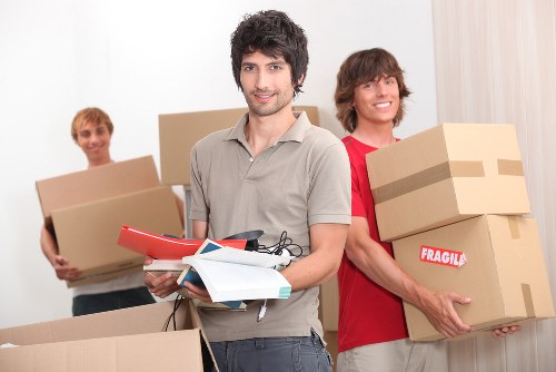 Packed boxes and furniture prepared for a home move in Wimbledon