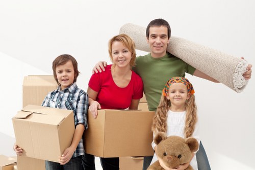 Local removal van service handling boxes and furniture in Wimbledon