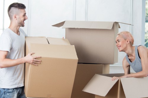 Local house removals team unloading items at a Wimbledon property