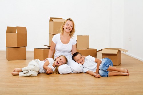 Flat move in Wimbledon with boxes and furniture ready for transport