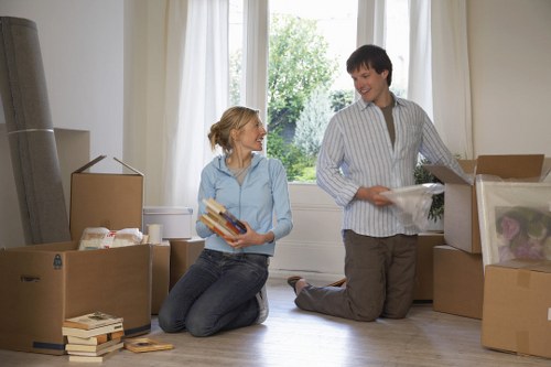 Professional movers planning access on a Wimbledon street