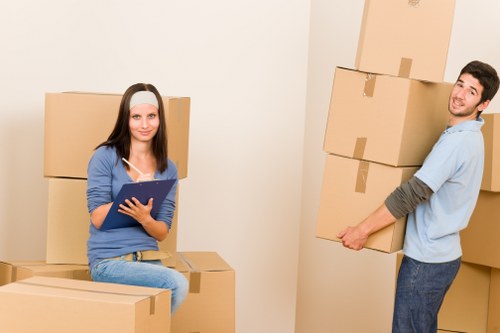Moving team loading furniture into a truck in Wimbledon